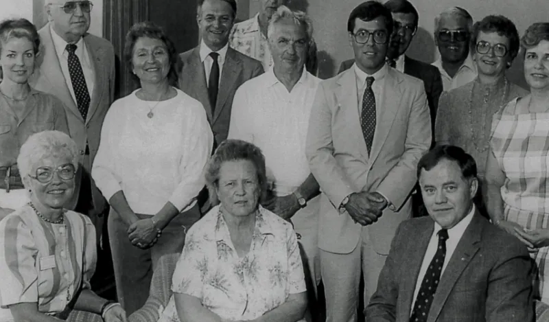 black and white photo of the founders of the North Hennepin Community College (NHCC) Foundation