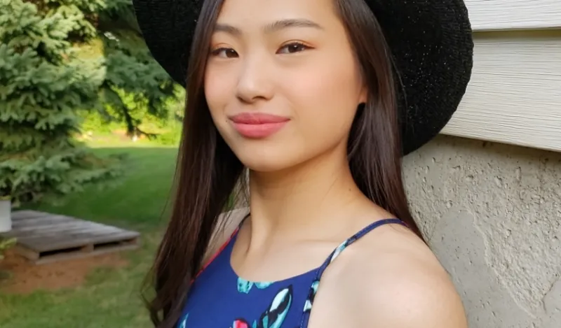 STEM Student Christina Yang standing outside smiling at the camera