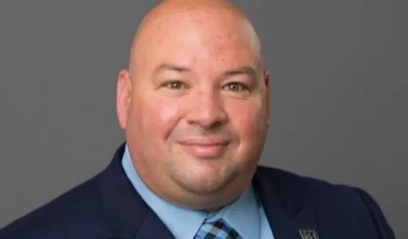man in a nice suit smiling 