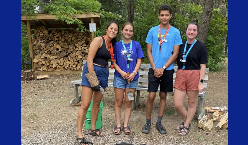 photo of students at a campsite