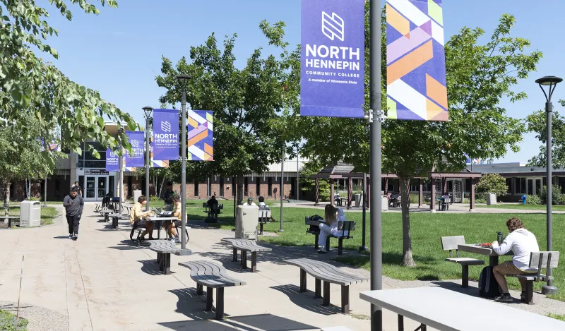 students on campus on a sunny day