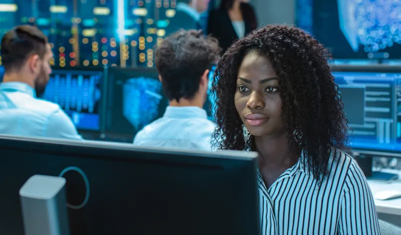 photo of a female working on a computer 