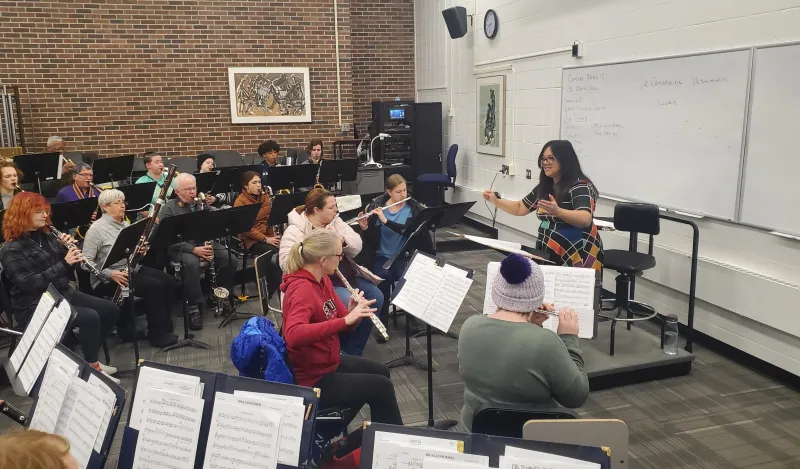 a photo of concert band rehearsing