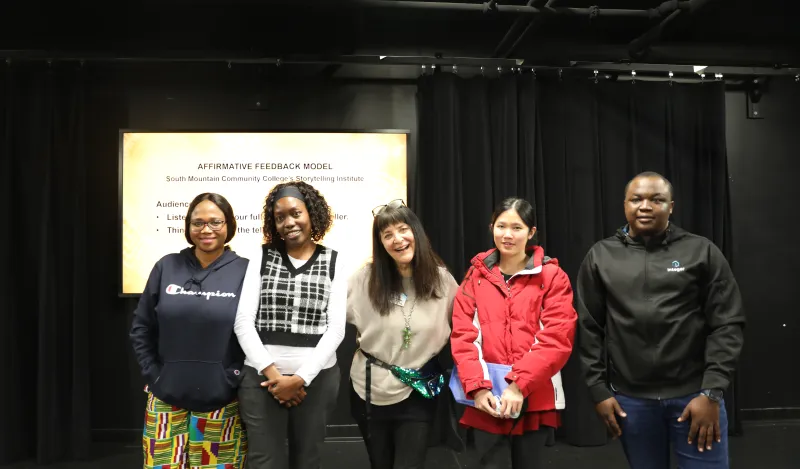 a photo of Shelly Siegel with a few of her storytelling students 