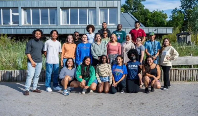 a photo of NHCC student, Donald Agik and his student group in the countryside of the Netherlands