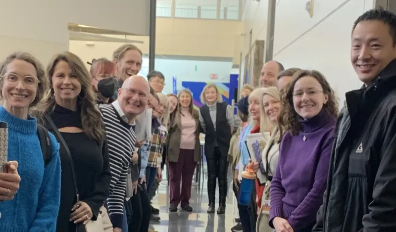 this is a photo of NHCC faculty posing for a group photo at the January 2025 Duty Day. 