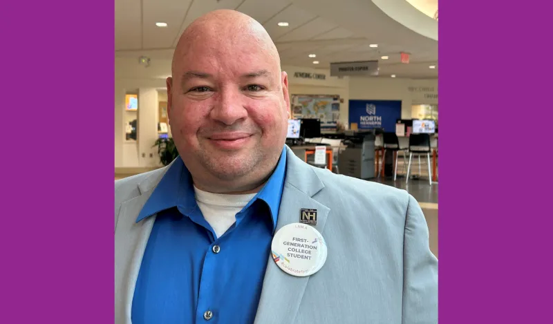 this is a headshot photo of NHCC President, Rolando Garcia standing in the hallway of the ES Building. 