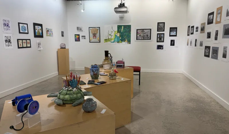 this is a photo of the NHCC Art Gallery with student art on the walls. 