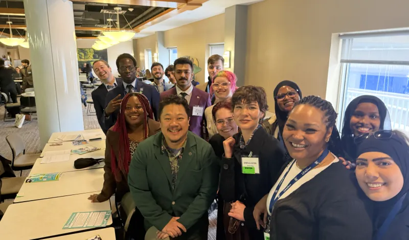 this is a photo of a group of students and a local legislator, smiling for the camera inside the Minnesota Capitol building on Advocacy Day 2026. 