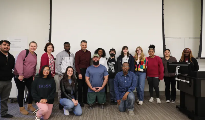 Group of students standing at the front of the room at NHCC