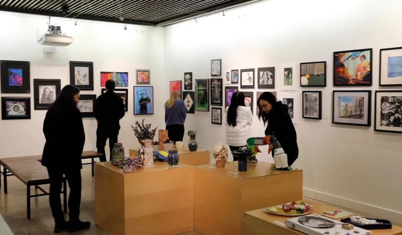 people looking at art in a gallery