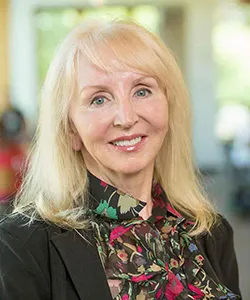 woman with blonde hair smiling