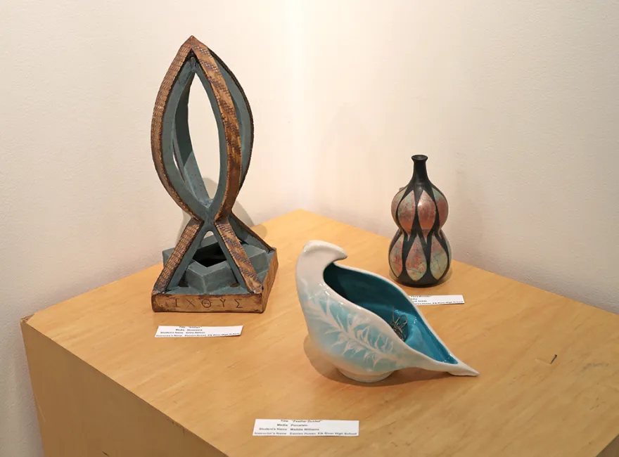 ceramic art on a table in a gallery