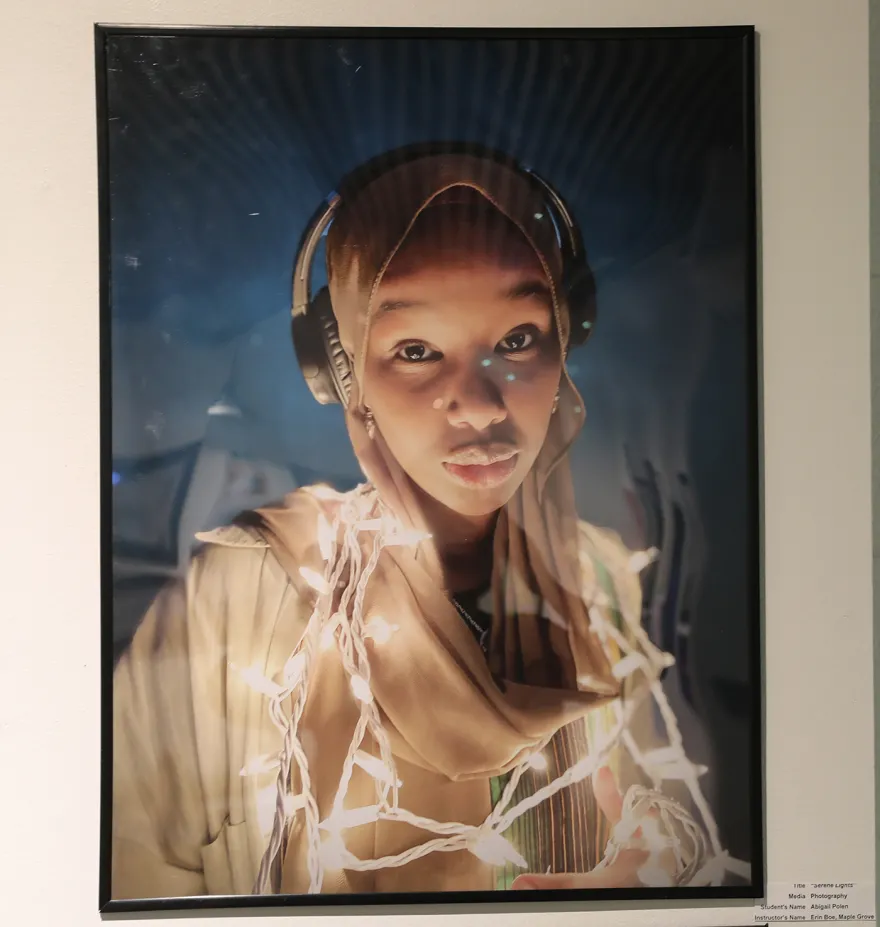 photo of a woman wearing headphones and lights 