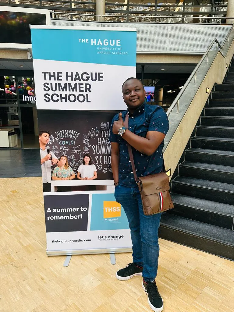 a photo of NHCC student, Donald Agik inside the Netherlands' The Hague School