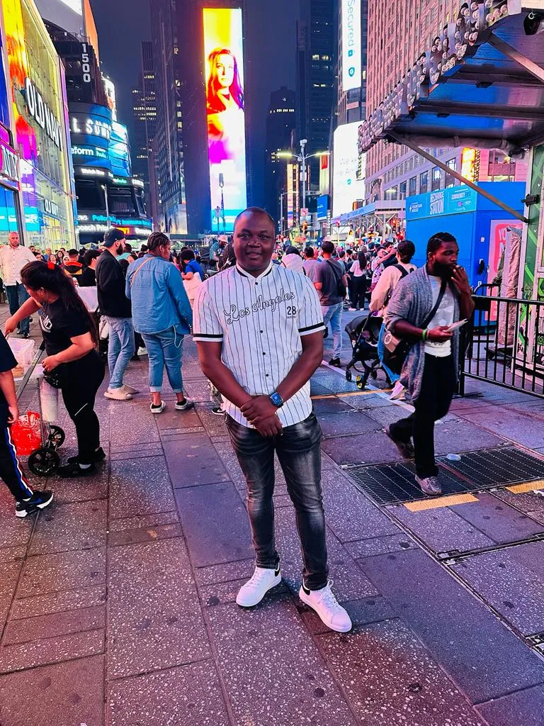 a photo of NHCC student, Donald Agik in New York's Times Square
