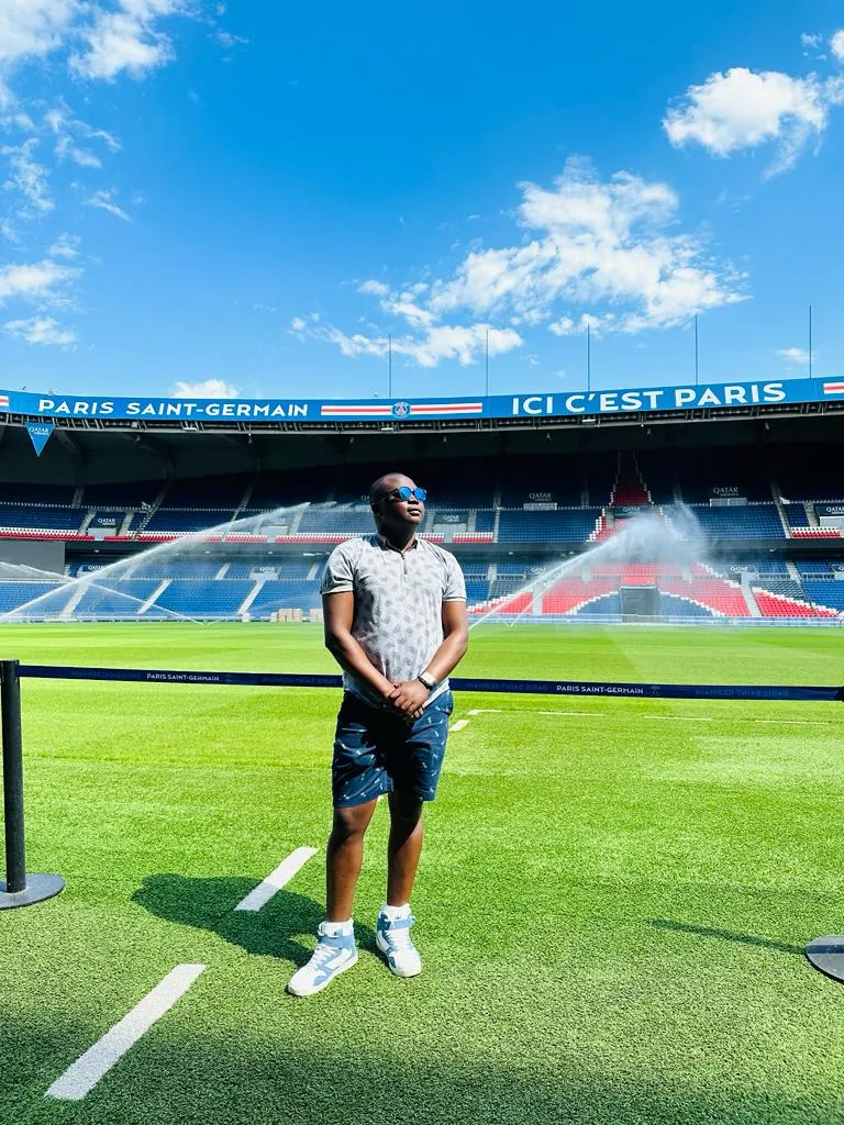 a photo of NHCC student, Donald Agik at the Paris St. Germain soccer stadium