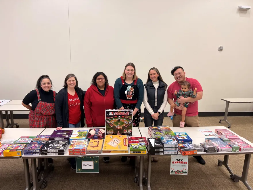 a photo of volunteers at the toy drive