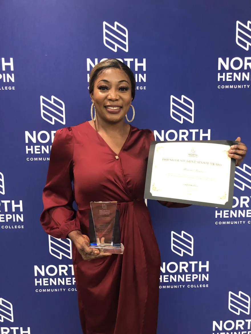 Photo of NHCC staff, Hawa Sanoe and her award