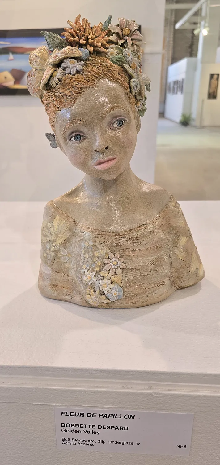 a ceramic bust art piece created by Bobbette Despard titled, Fleur De Papillon