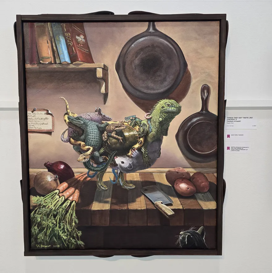 A colorful painting of a chicken done by Thomas Stewart at the MN State Fair, receives an NHCC Art Award