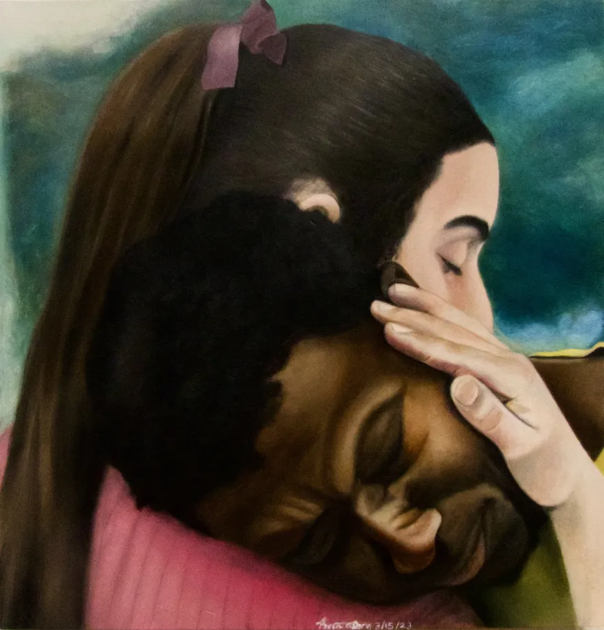 a photo of an oil painting of a man and a woman hugging, titled Consolation by Nana Aforo, guest artist. 