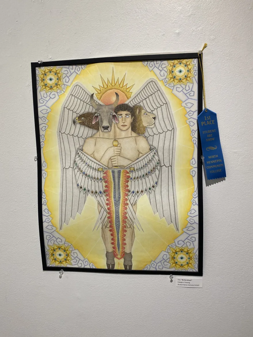This is a photo of a drawing that received an award ribbon at the NHCC Student Art Show, titled, Be Not Afraid. 