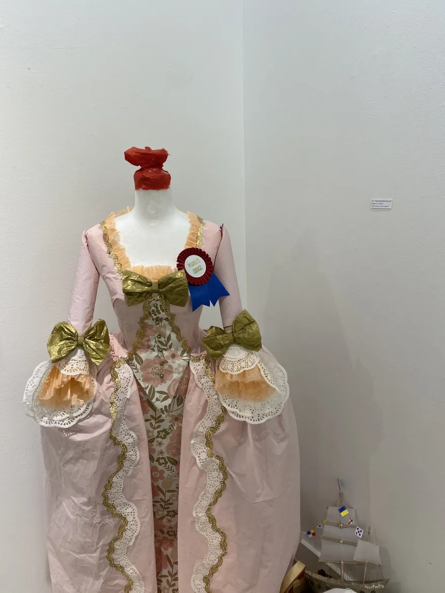 This is a photo of the sculpture and 3-Dimensional piece that received the People’s Choice Award at the NHCC Student Art Show, titled, “Octavia Breaths Her Last.” 