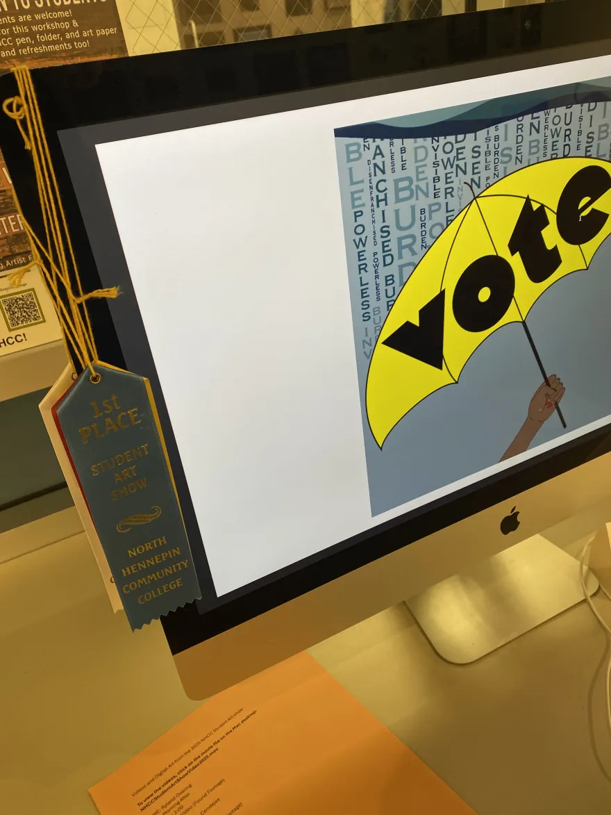 this is a photo of a computer in the Art Gallery showing the video projects that students made for the Student Art Show. 