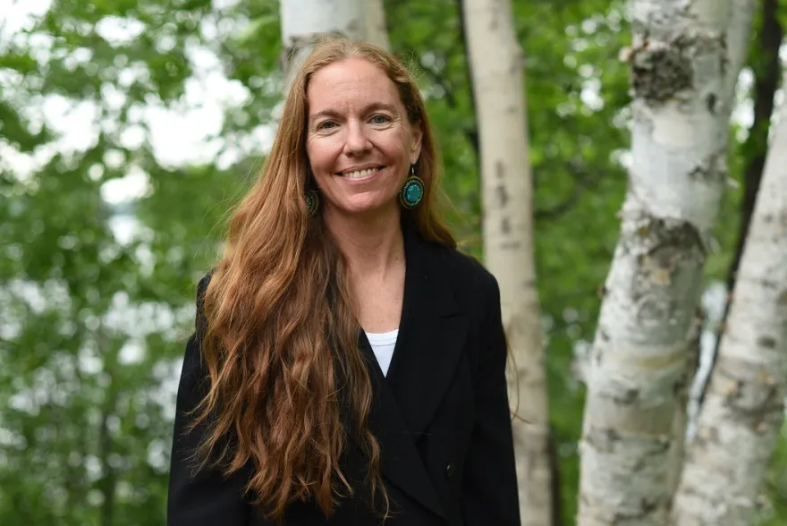 this is an outdoor headshot photo of former Bemidji State University Sustainability Director, and NHCC special guest, Erika Bailey-Johnson. 