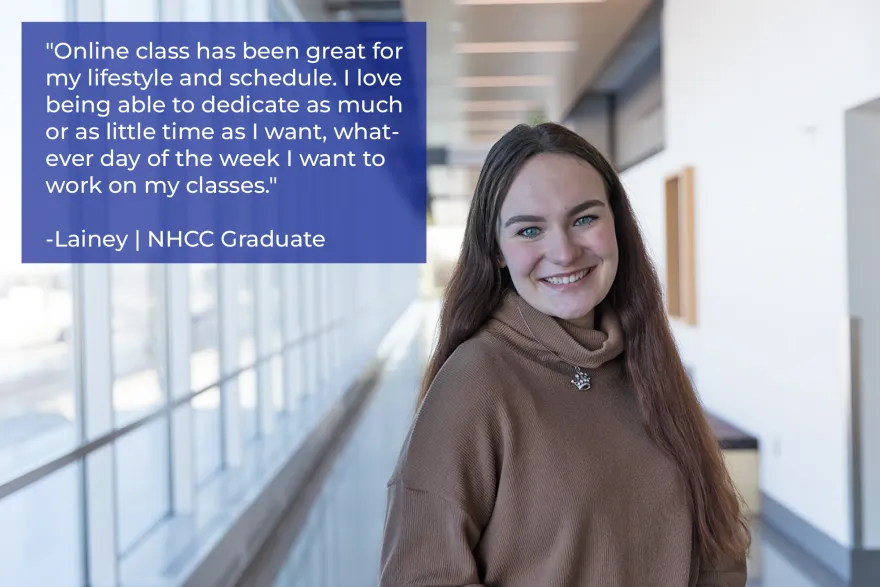 woman smiling in a hallway with the words: Online class has been great for my lifestyle and schedule. I love being able to dedicate as much or as little time as I want, whatever day of the week I want to work on my classes.