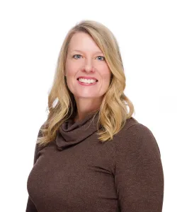 this is a smiling headshot photo of NHCC nursing faculty, Desirri Arneson.