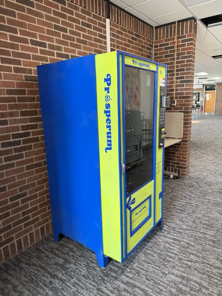 this is a side photo of the new personal care product vending machine in NHCC's Campus Center. 