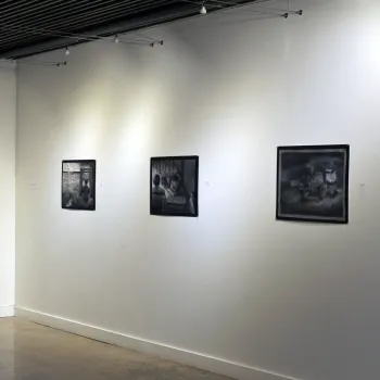picture of the NHCC art gallery with 3 charcoal life drawings 